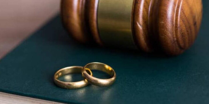 Double rings near a gavel | The Divorce Process in Kenya | Njaga & Co. Advocates family lawyer