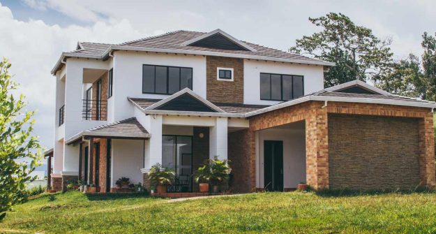 Modern two-story house with landscaped surroundings | Owning Property in Kenya by Foreigners | Njaga & Co. Advocates property and real estate law services