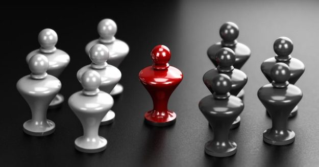 chess pawns arranged with the red pawn in the middle | Handling Succession Disputes in Kenya | Njaga & Co Advocates family law legal articles