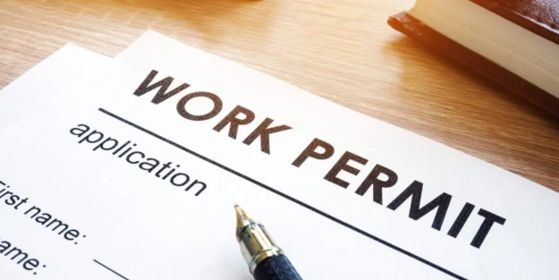 Work permit application document with pen on it | Kenya Introduces Innovative Work Permits to Attract Global Talent and Boost Economy | Njaga & Co. Advocates Immigration lawyer