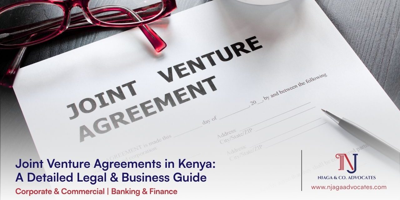 Glasses next to a Joint Venture Agreement | Joint venture agreements guide in Kenya | corporate lawyers | commercial lawyers in Kenya