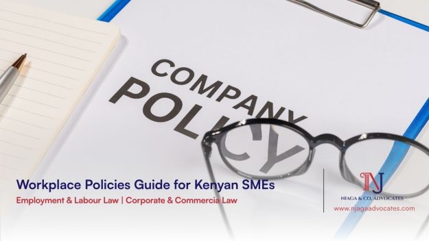 A pair of glasses on a company policy document showing Workplace Policy concept | SMEs in Kenya policies