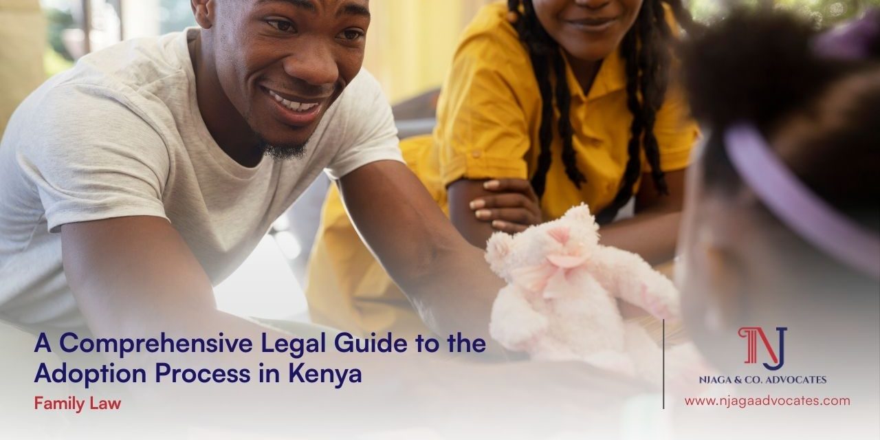 Legal Guide to the Adoption Process in Kenya African descent gent and lady all smiles giving a baby teddy bear to a baby girl showing adoption concept | Legal Guide to the Adoption Process in Kenya | family lawyers in kenya | child adoption in kenya