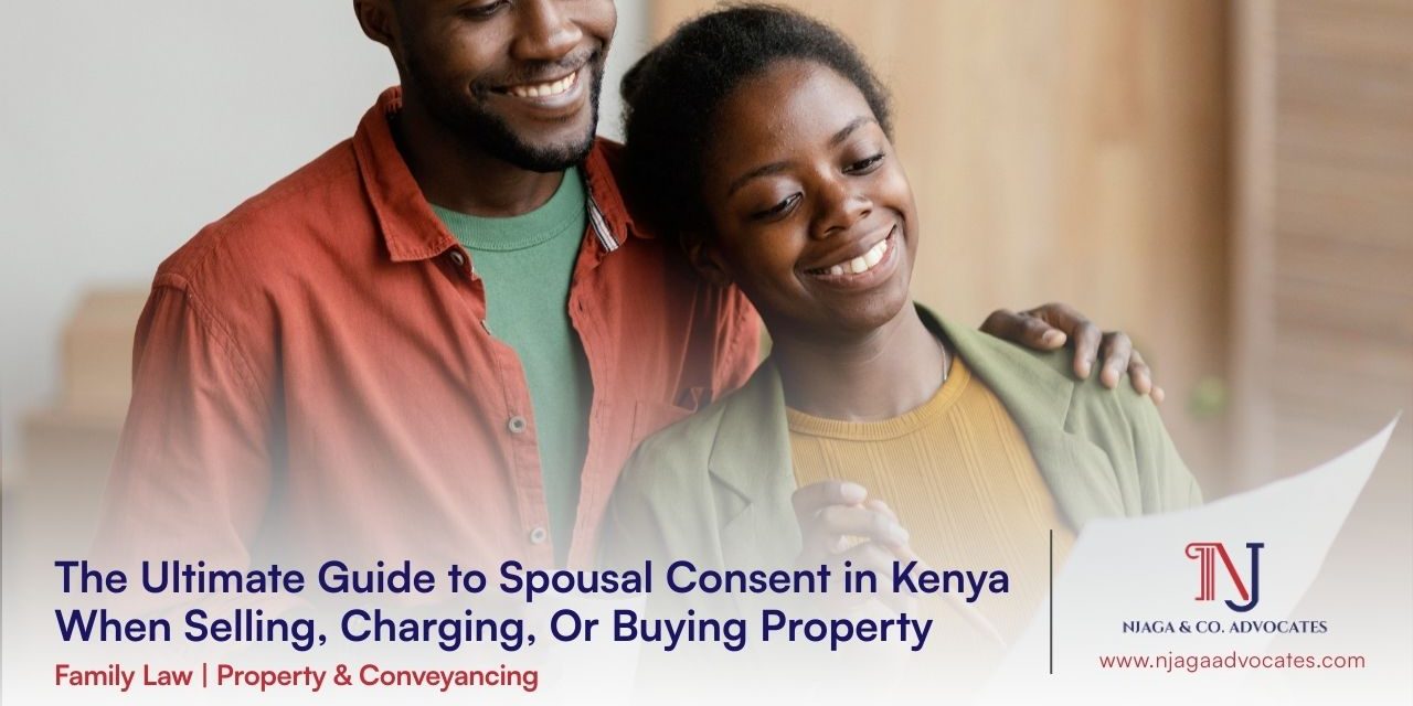 African descent couple male and lady hugging all smiles looking at a document in the lady's hands | Spousal Consent in Kenya When Selling, Charging, Or Buying Property