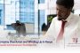 Commercial lawyer working on a document at his office | Company Dissolution and Winding Up in Kenya guide | 5 Common FAQs | commercial lawyer in Nairobi
